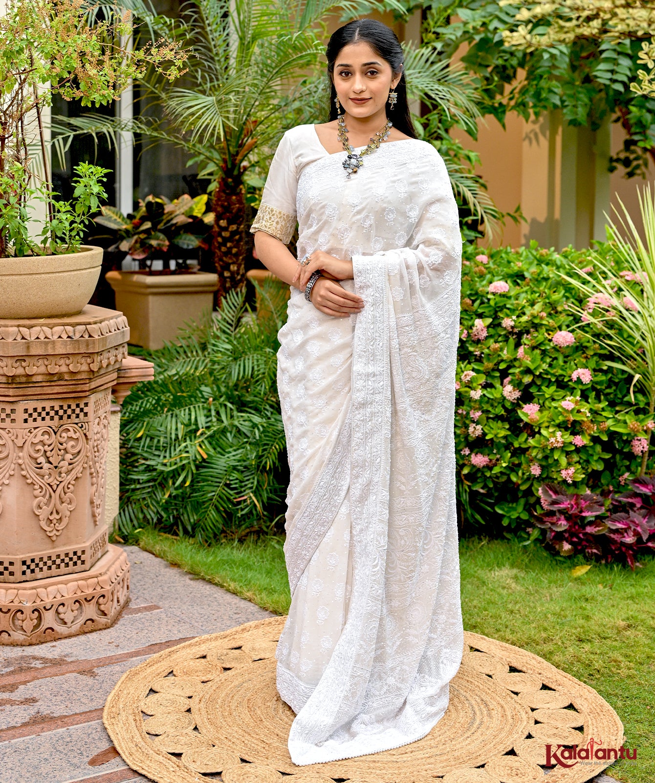 Off White Georgette Chikankari Saree with Zari Border